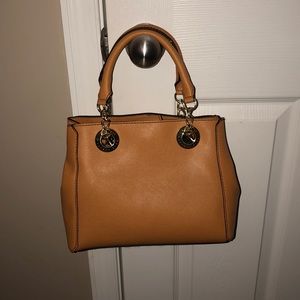 Mustard colored small satchel